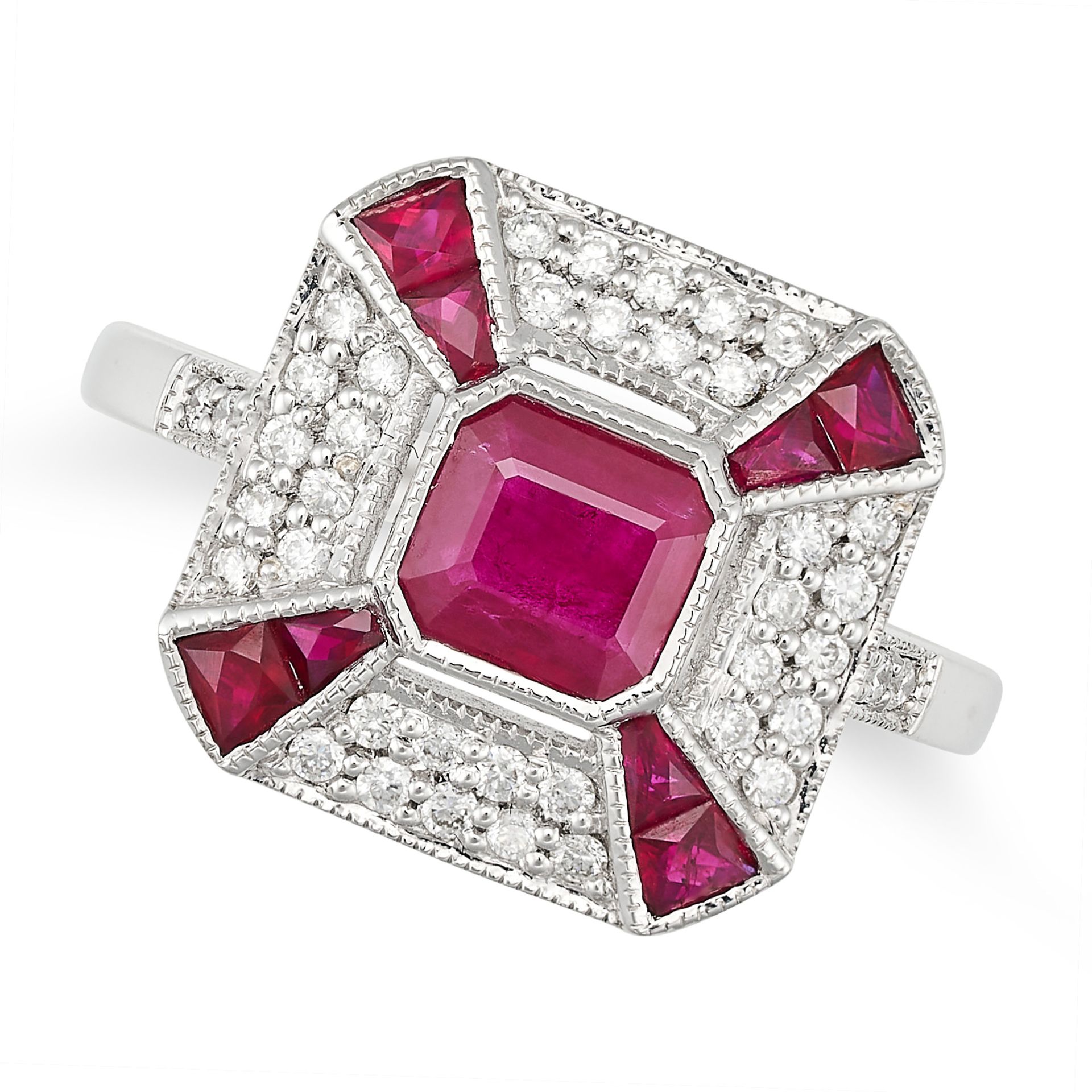 A RUBY AND DIAMOND DRESS RING in white gold, set with an octagonal step cut ruby in a stylised cl...