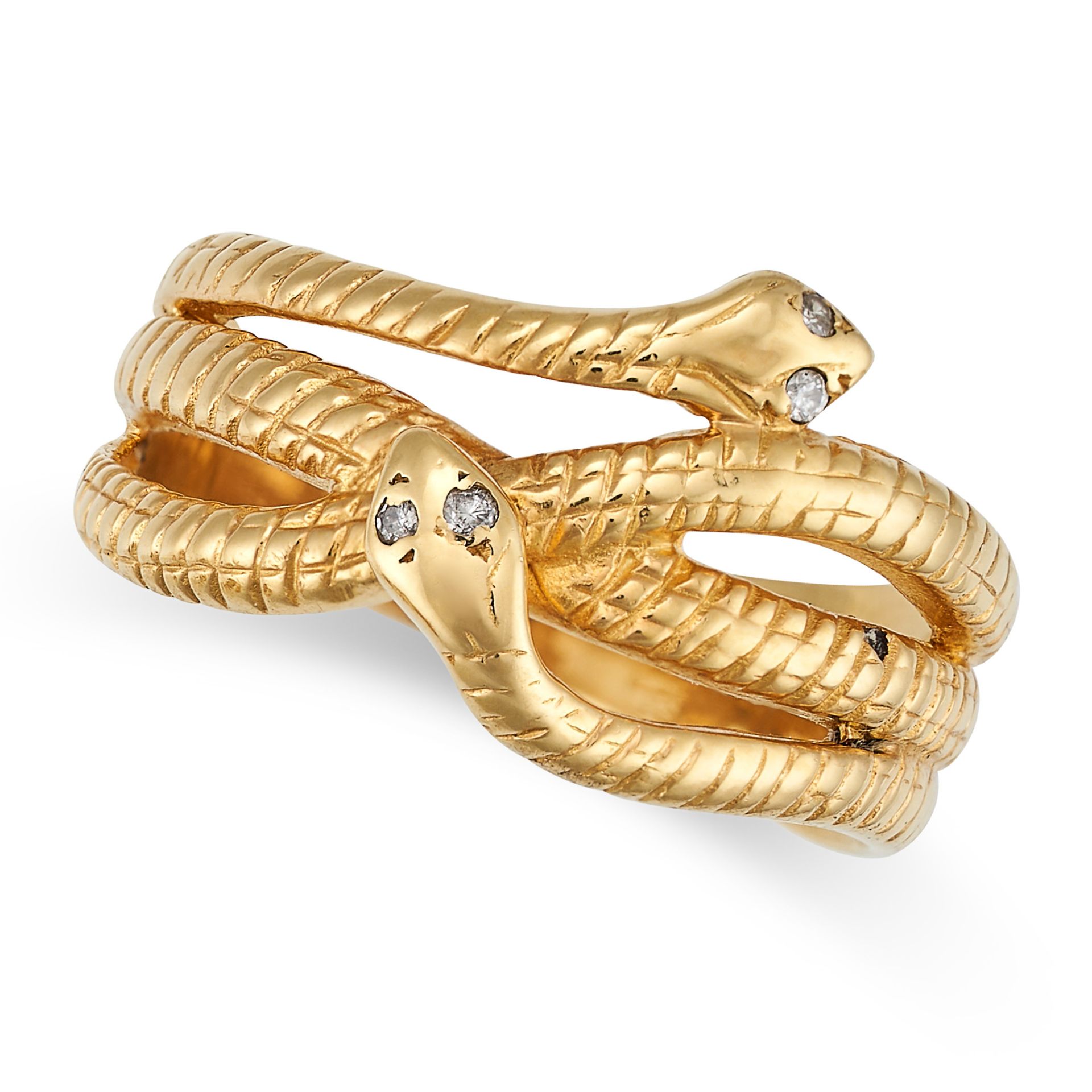 A VINTAGE DIAMOND SNAKE RING in yellow gold, designed as two coiling snakes with diamond set eyes...