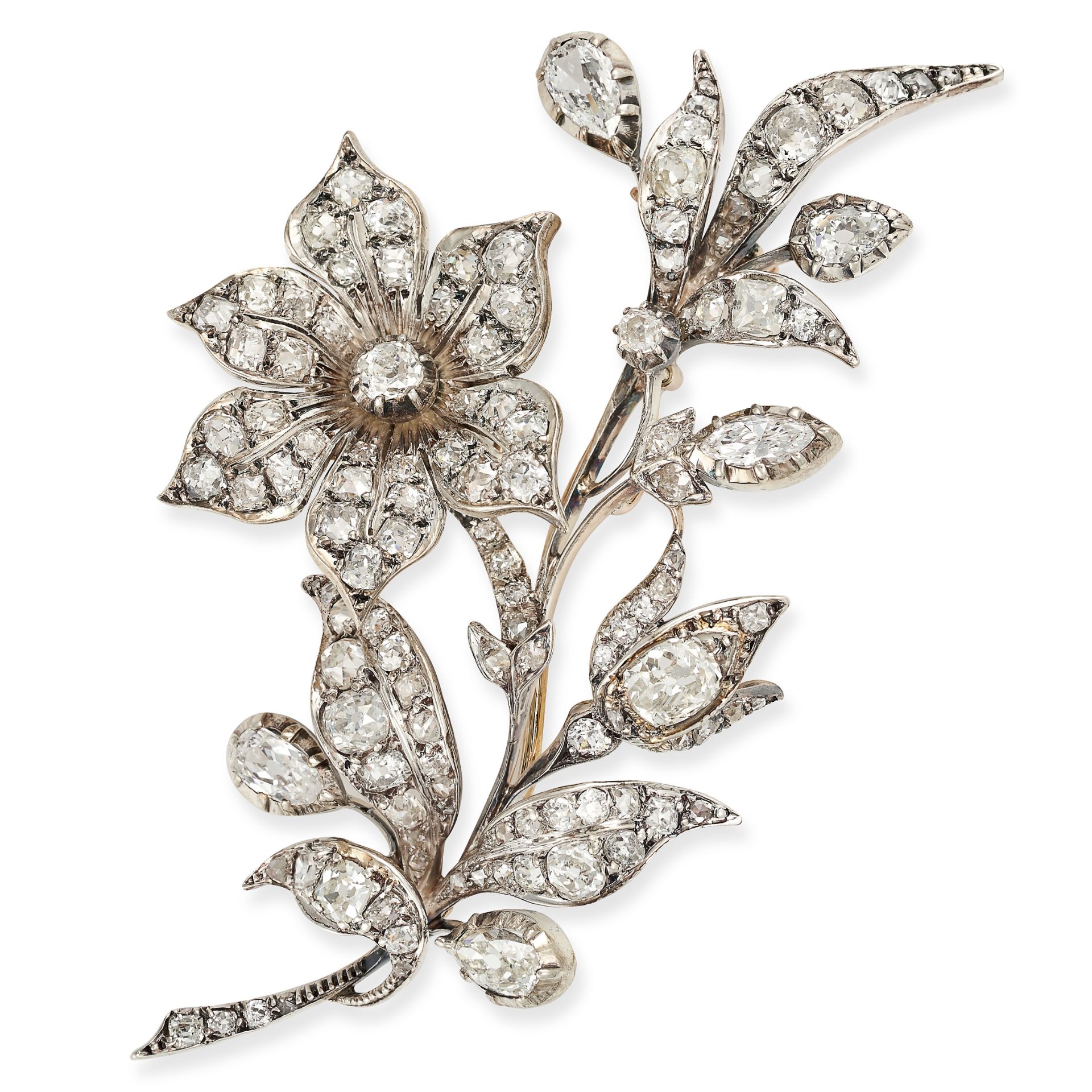 AN ANTIQUE VICTORIAN DIAMOND EN TREMBLANT BROOCH, 19TH CENTURY in silver and yellow gold, designe...