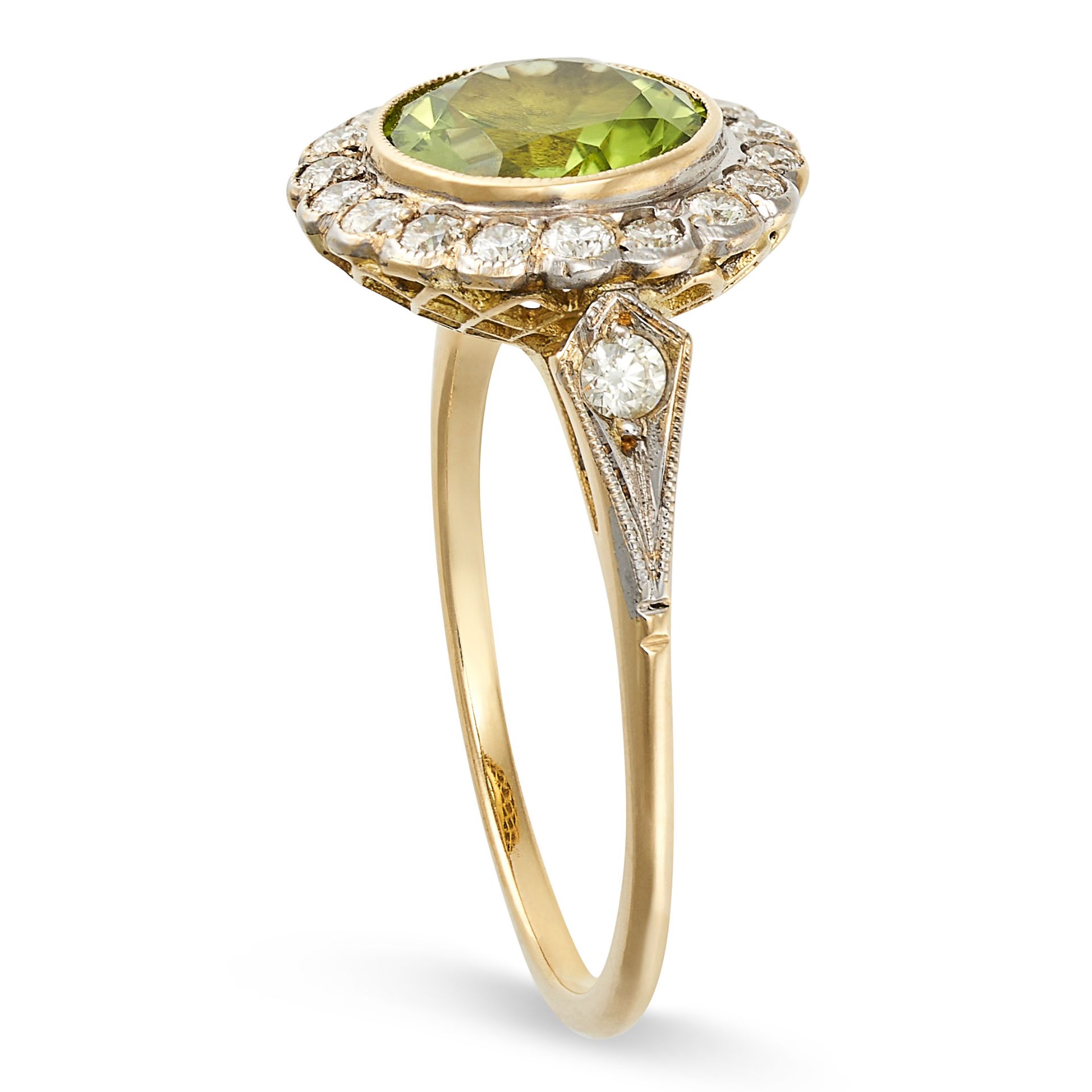 A PERIDOT AND DIAMOND CLUSTER RING in yellow gold, set with a round cut peridot in a cluster of r... - Image 2 of 2