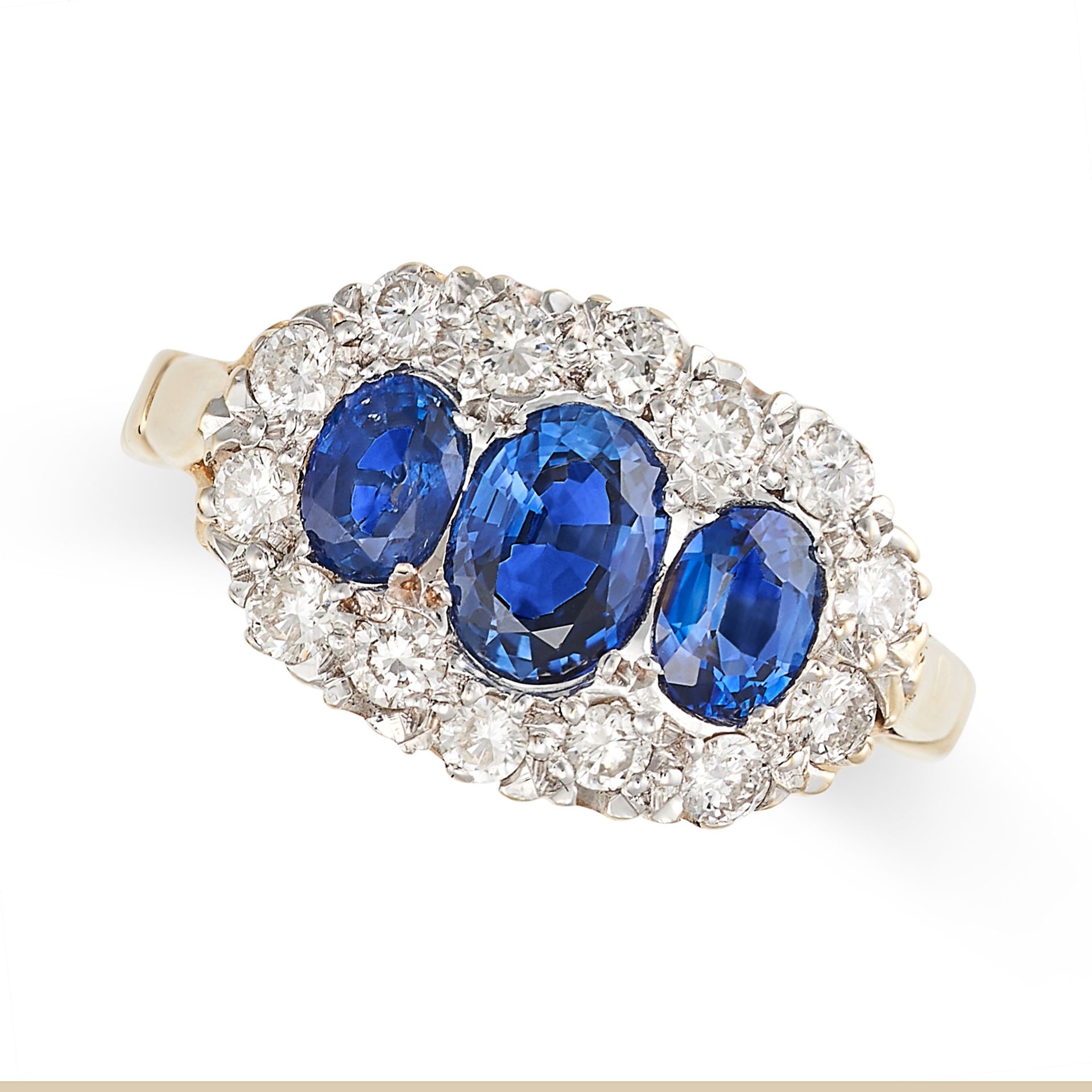 A SAPPHIRE AND DIAMOND THREE STONE CLUSTER RING in 14ct yellow and white gold, set with three ova...