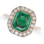 AN ANTIQUE EMERALD AND DIAMOND CLUSTER RING in yellow gold, set with an octagonal step cut of app...