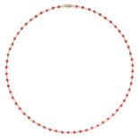 A CORAL CHAIN NECKLACE in 14ct yellow gold, comprising a row of coral beads to yellow gold wire, ...