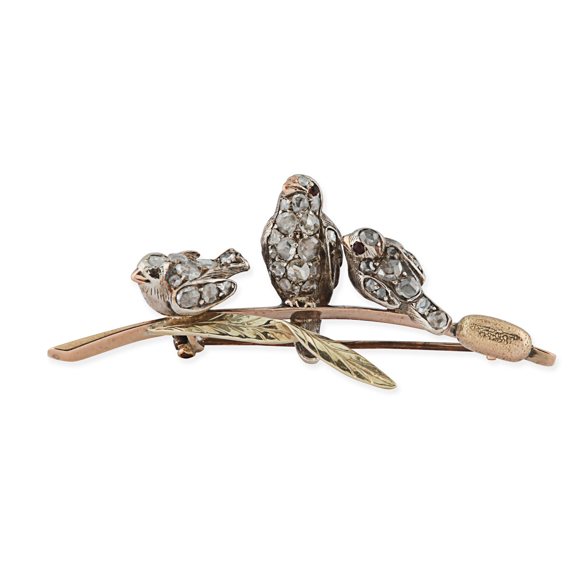 AN ANTIQUE DIAMOND AND RUBY BIRD BROOCH, 19TH CENTURY in yellow gold and silver, designed as thre...