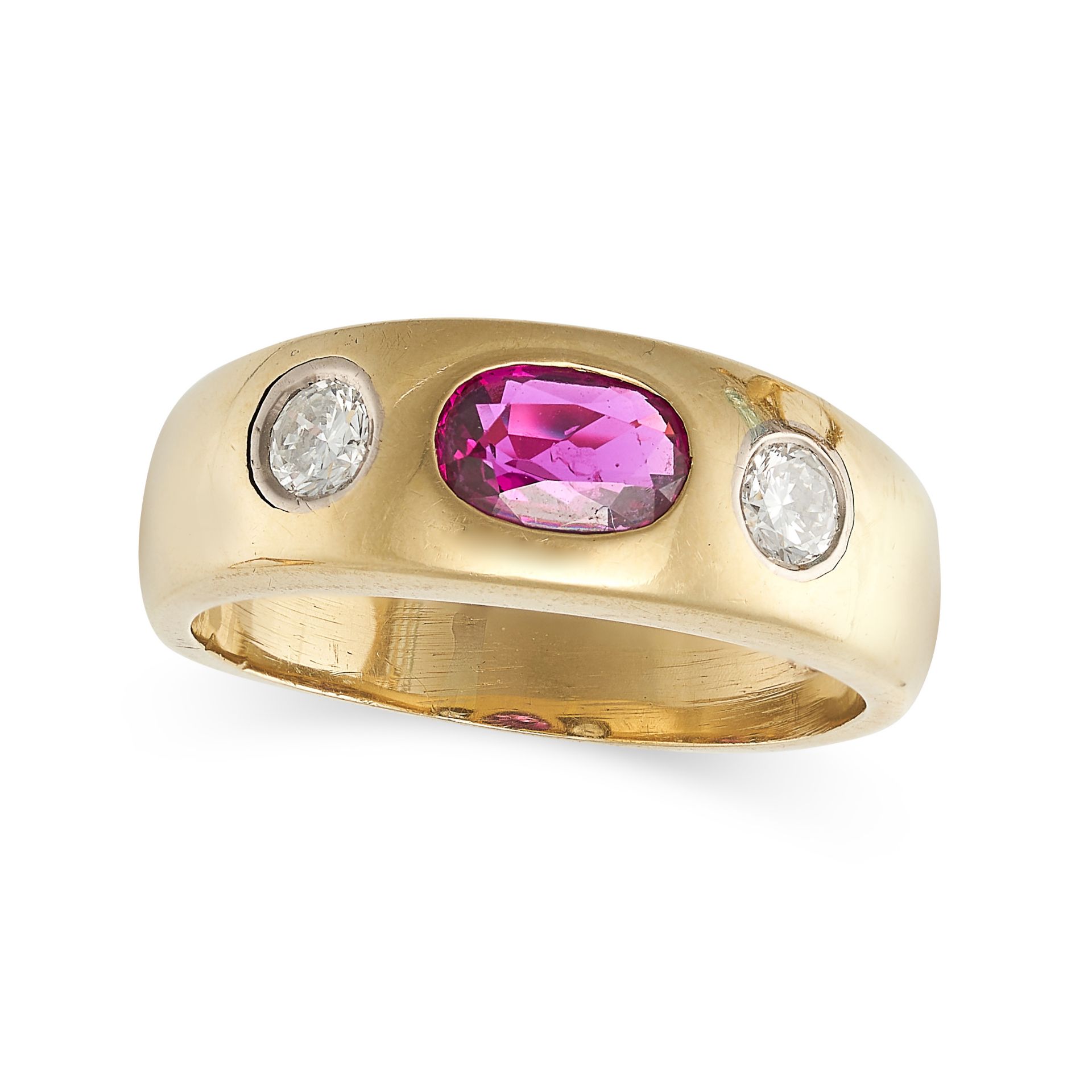 A RUBY AND DIAMOND GYPSY RING in 14ct yellow gold, set with an oval cut ruby between two round br...