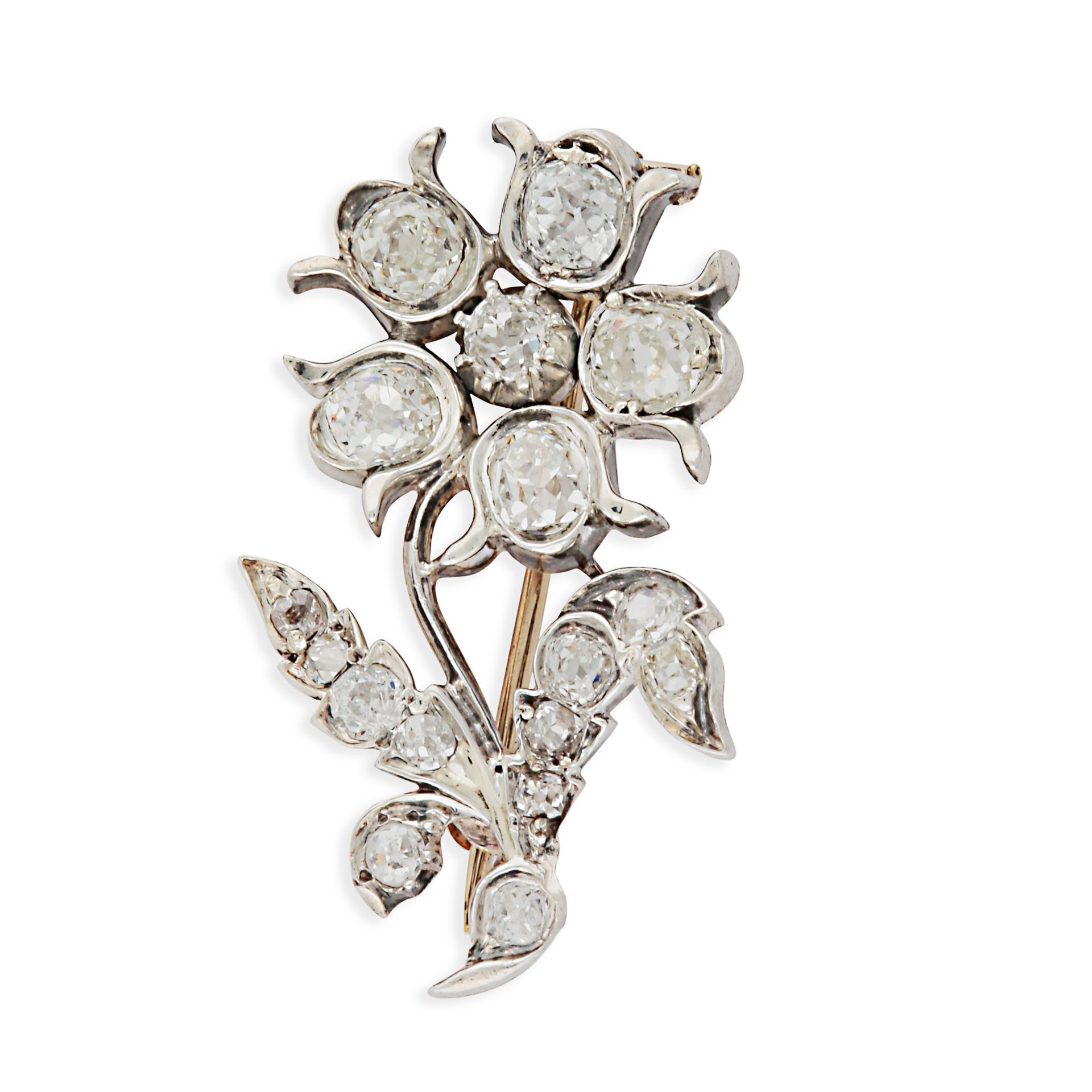 A DIAMOND FLOWER BROOCH designed as a flower set throughout with old cut diamonds, no assay marks...