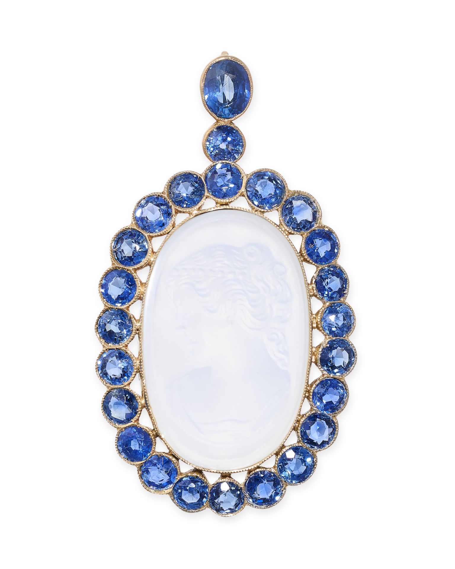 A FINE CARVED MOONSTONE CAMEO AND SAPPHIRE PENDANT set to the centre with an oval moonstone intag...