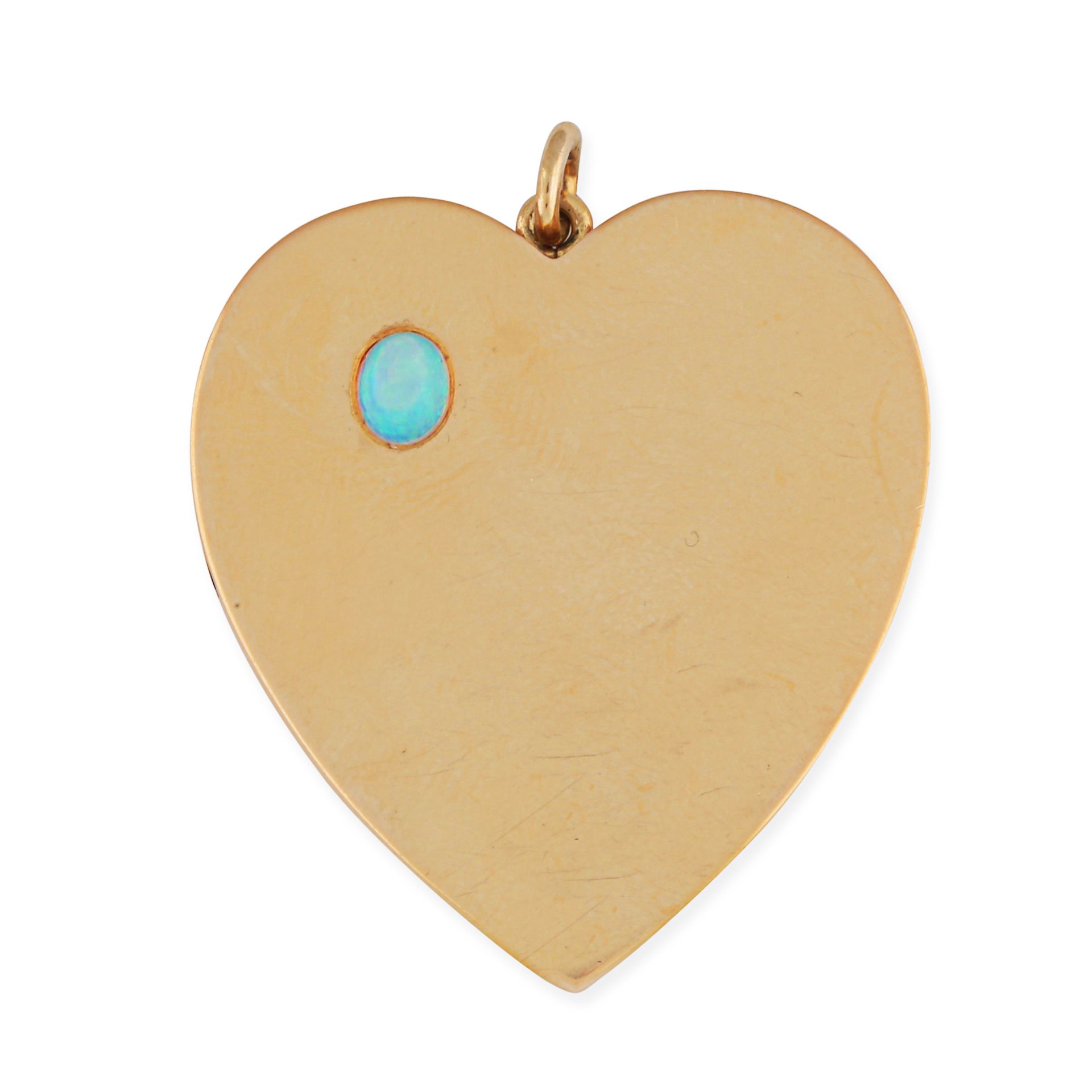 AN ANTIQUE OPAL HEART LOCKET PENDANT in yellow gold, the hinged heart shaped locket set with a ca...