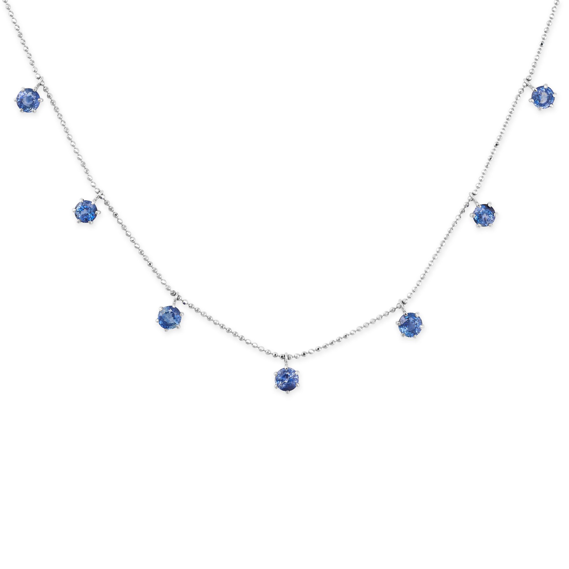 A SAPPHIRE NECKLACE in 18ct white gold, comprising a fancy link chain suspending seven round cut ...