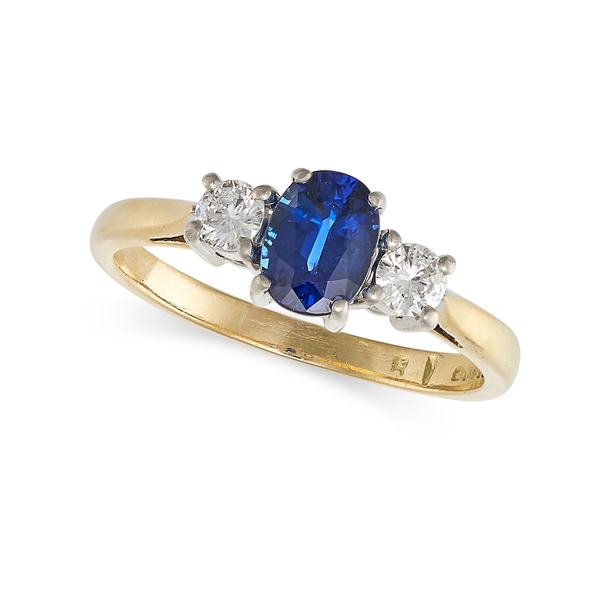 A SAPPHIRE AND DIAMOND THREE STONE RING in 18ct yellow gold, set with an oval cut sapphire of app...