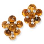 A PAIR OF CITRINE AND DIAMOND EARRINGS in yellow gold, each set with a cluster of polished citrin...