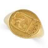 A GOLD SIGNET RING in yellow gold, the oval face depicting a family crest, no assay marks, size T...