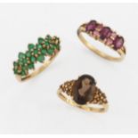 THREE 9 CARAT GOLD GEM-SET RINGS