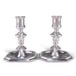 A PAIR OF ELIZABETH II SILVER CANDLESTICKS