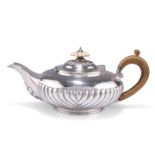 A GEORGE IV SILVER TEAPOT