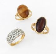 THREE 9 CARAT GOLD GEM-SET RINGS