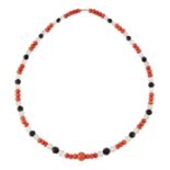 A CORAL, ROCK CRYSTAL AND GLASS BEAD NECKLACE