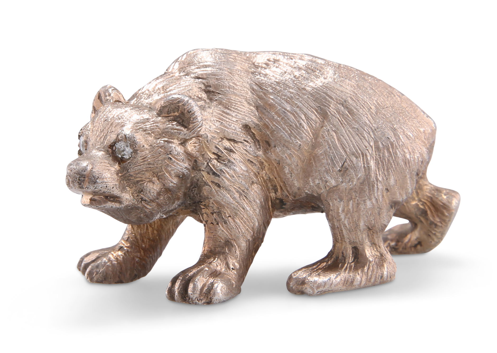 A RUSSIAN CAST SILVER MODEL OF A BEAR