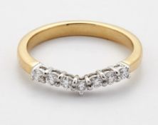 AN 18 CARAT DIAMOND WISHBONE RING