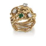 INGEBORG RUTH BRATMAN - AN 18 CARAT GOLD EMERALD AND DIAMOND RING