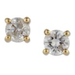 A PAIR OF SOLITAIRE DIAMOND EARRINGS