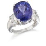 AN 18 CARAT WHITE GOLD TANZANITE AND DIAMOND RING