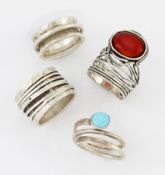 THREE MEXICAN SILVER RINGS AND AN ISRAELI SILVER CARNELIAN RING