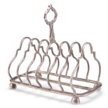 AN EDWARDIAN SILVER TOAST RACK