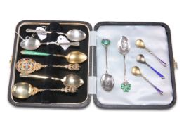 A COLLECTION OF SILVER AND ENAMEL SPOONS
