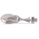 AN ELIZABETH II SILVER CADDY SPOON