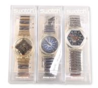 THREE ASSORTED SWATCH WATCHES