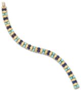 CARTIER - A LAPIS LAZULI AND TURQUOISE BRACELET