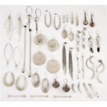 TWENTY ONE PAIRS OF SILVER EARRINGS