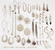 TWENTY ONE PAIRS OF SILVER EARRINGS