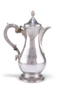 A GEORGE III SILVER BALUSTER JUG AND COVER