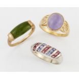 TWO 9 CARAT GOLD GEM-SET RINGS AND A SILVER GEM-SET RING