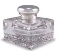 A GEORGE V SILVER-TOPPED CUT-GLASS INKWELL