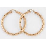 A PAIR OF 9 CARAT GOLD TWISTED HOOP EARRINGS