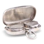 AN EDWARDIAN SILVER DOUBLE SOVEREIGN CASE