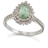 AN 18 CARAT GOLD GREEN BERYL AND DIAMOND CLUSTER RING