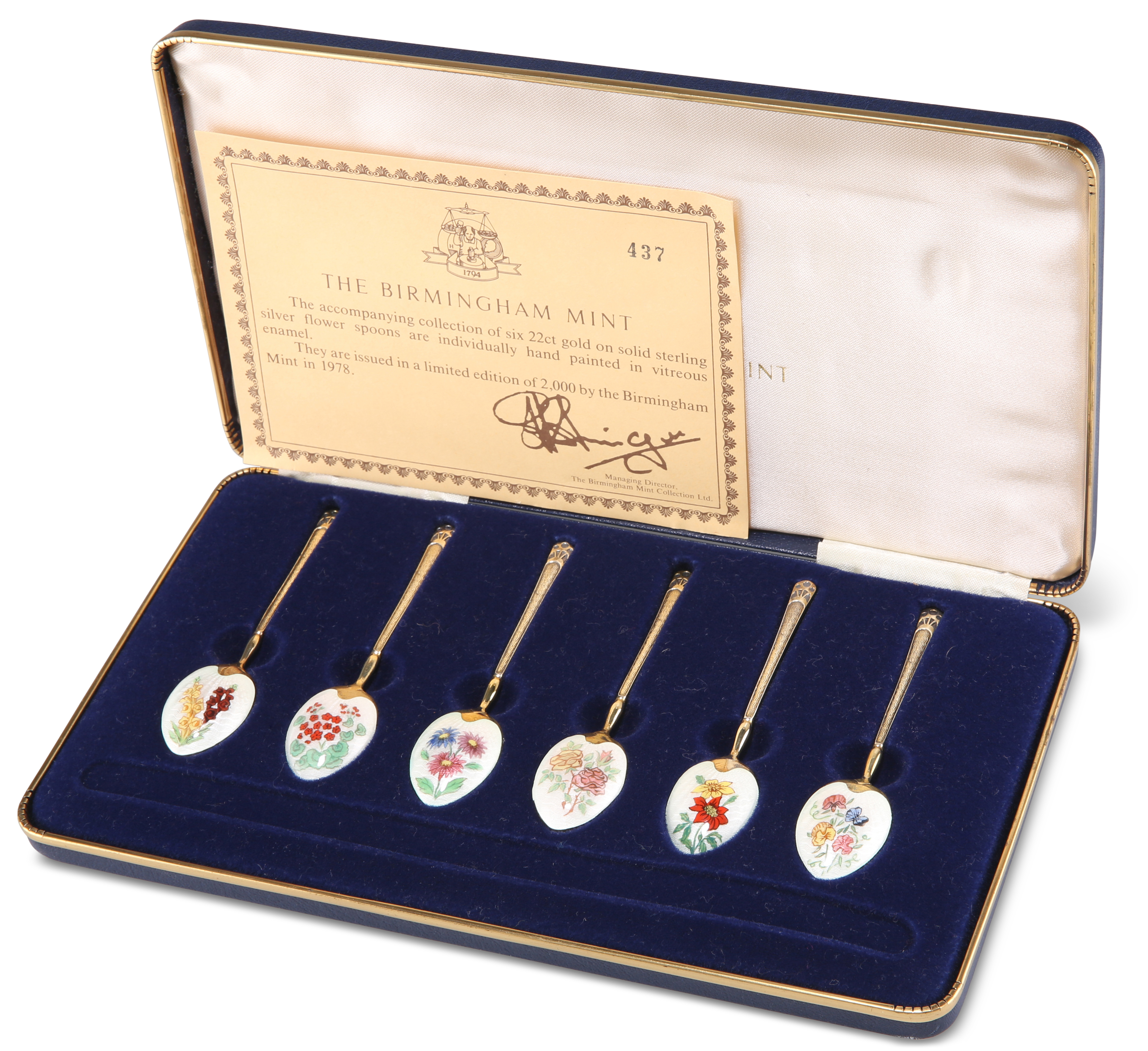 A SET OF SIX ELIZABETH II SILVER-GILT AND ENAMEL LIMITED EDITION SPOONS