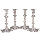 A FINE SET OF FOUR GEORGE II SILVER CANDLESTICKS