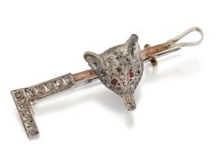 A NOVELTY DIAMOND AND RUBY FOX AND CROP BROOCH