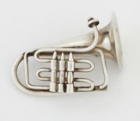 A NOVELTY HORN BROOCH