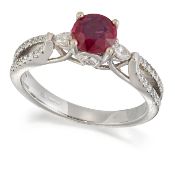 AN 18 CARAT WHITE GOLD RUBY AND DIAMOND RING