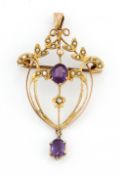 AN ART NOUVEAU AMETHYST AND SEED PEARL BROOCH / PENDANT