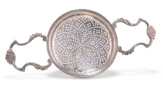 A GEORGE III-STYLE SILVER LEMON STRAINER