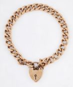 A CURB LINK BRACELET WITH A 9 CARAT GOLD PADLOCK CLASP