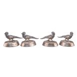 A SET OF FOUR GEORGE V SILVER PLACE CARD HOLDERS