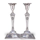 A PAIR OF ADAM REVIVAL SILVER CANDLESTICKS